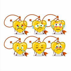 Yellow heart arrow necklace cartoon character with sad expression