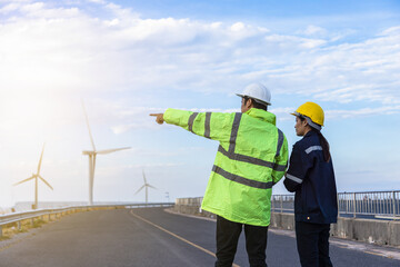 Engineers analysis windmill engineers inspection and progress check wind turbine.