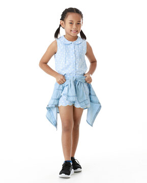 Portrait Full Body Studio Cutout Shot Of Asian Young Happy Cheerful Pigtail Braid Hairstyle Elementary School Girl In Blue Sleeveless Dress Standing Posing Smiling Look At Camera On White Background