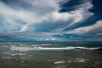Dramatic coastal landscape at with clouds and ocean at Dominical, near Uvita, Puntarenas Province, Pacific Coast of Costa Rica
