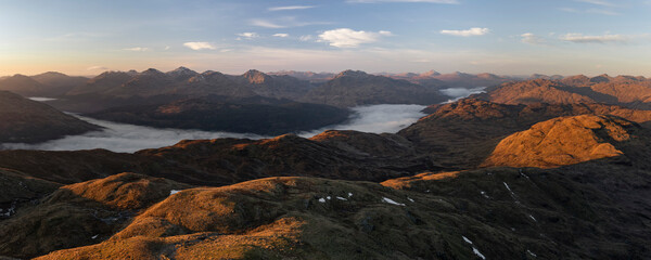 Scottish Highlands mountain landscape at sunset, taken when hiking up Ben Lomond in Trossachs...