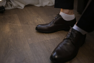Fototapeta na wymiar Stylish men's brown leather shoes