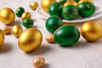 Plate with stylish Easter eggs  on light background