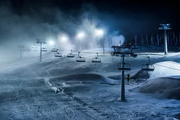 Zelfklevend Fotobehang Ski lifts and ski slopes in the ski resort of Levi inside the Arctic Circle in Finnish Lapland, Finland © Matthew