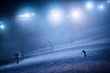 Ski lifts and ski slopes in the ski resort of Levi inside the Arctic Circle in Finnish Lapland,...