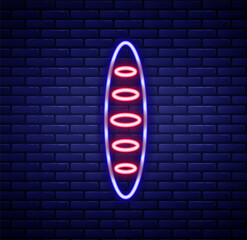 Glowing neon line French baguette bread icon isolated on brick wall background. Colorful outline concept. Vector