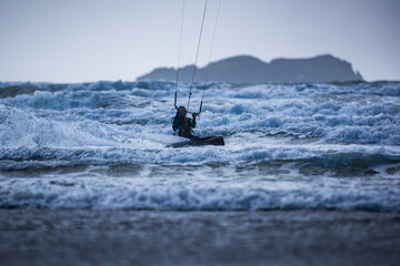 Kitesurfer on Broadhaven Beach, Pembrokeshire Coast National Park, Wales, United Kingdom