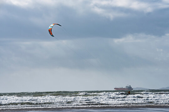 Kitesurfer on Broadhaven Beach, Pembrokeshire Coast National Park, Wales, United Kingdom