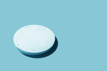 Abstract minimal scene - empty white podium on light blue background. Cylinder form stand,...
