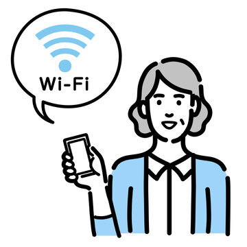 スマートフォンを持ってWi-Fiの説明をしているシニアの女性

