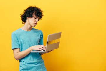curly guy with laptop work online finance isolated backgrounds