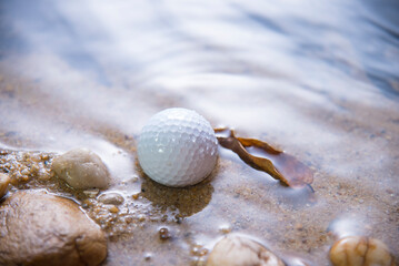 golf ball in water hazard