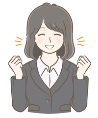 ガッツポーズをして喜ぶスーツの若い女性