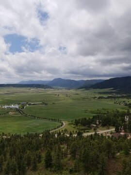 Scenic Colorado View From Mountain with Rock Formations, Blue Skies and Green Vegetation