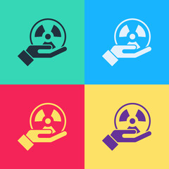 Pop art Radioactive in hand icon isolated on color background. Radioactive toxic symbol. Radiation Hazard sign. Vector