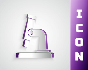 Paper cut Microscope icon isolated on grey background. Chemistry, pharmaceutical instrument, microbiology magnifying tool. Paper art style. Vector