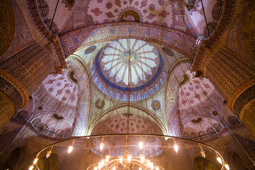 Fototapeta na wymiar Painted ceiling inside Blue Mosque (Sultan Ahmed Mosque or Sultan Ahmet Camii), Istanbul, Turkey, Eastern Europe