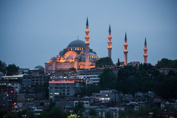 Naklejka premium Suleymaniye Mosque at night seen across Golden Horn, Istanbul, Turkey, Eastern Europe