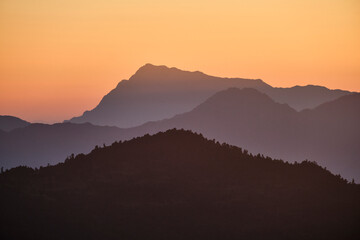 Bright orange sunset in the mountains