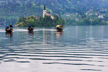 Pletna rowing boat ride to Lake Bled Island, Gorenjska, Upper Carniola Region, Slovenia, Europe