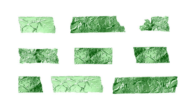 Torn tapes set isolated on white background. Green, glossy sticky pieces of duct tape of different sizes. High quality photo