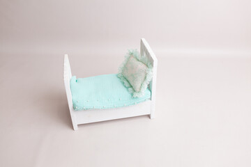 Tiny vintage baby bed backdrop