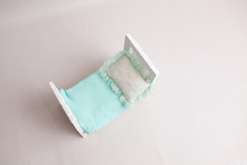 Tiny vintage baby bed backdrop