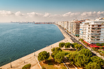 Aerial panorama over the promenade of Thessaloniki city with facades of buildings and a walking pedestrian path along the sea from White Tower viewpoint. Visit Greece and sightseeing concept
