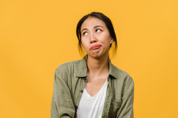 Portrait of young Asia lady with negative expression, excited screaming, crying emotional angry in...