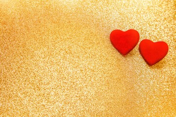 Heart symbol on a gold shiny background

