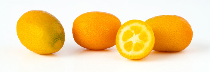 Close up photo of kumquat fruit on isolated white background.