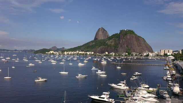 Footage of sea, boats, and mountains. Sugarloaf Mountain, Rio de Janeiro, Brazil.