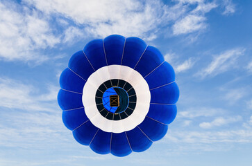 Hot air balloon flight over blue sky