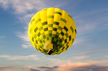 Hot air balloon flight over blue sky