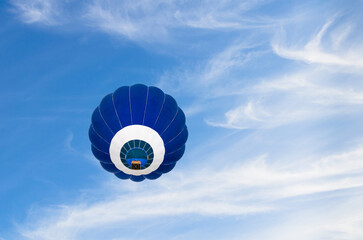 Hot air balloon flight over blue sky