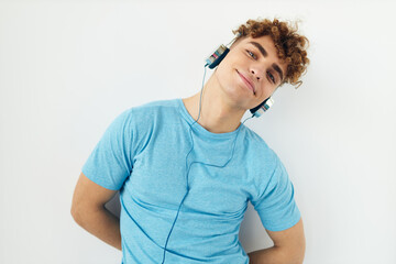 kinky guy in blue t-shirts headphones fashion Lifestyle unaltered