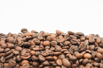 coffee on a white background close-up. concept of making coffee. roasted coffee beans