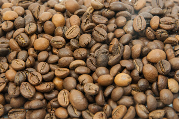 coffee beans close up. coffee drinking concept. roasted coffee grain	