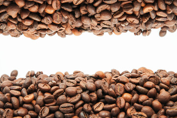coffee on a white background close-up. concept of making coffee. roasted coffee beans