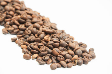 coffee on a white background close-up. concept of making coffee. roasted coffee beans