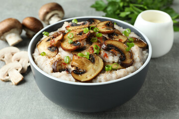 Concept of tasty food with risotto with mushrooms, close up