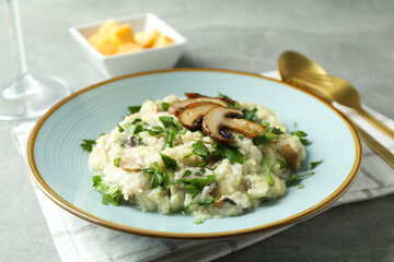 Fototapeta na wymiar Concept of tasty food with risotto with mushrooms, close up