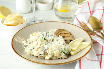 Concept of tasty food with risotto with mushrooms, close up