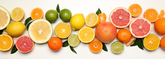 Different citrus fruits on white background, top view - obrazy, fototapety, plakaty