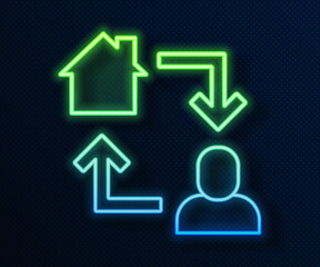 Glowing neon line Online working icon isolated on blue background. Freelancer man working on laptop at his house. Remote work. Distant job concept. Vector