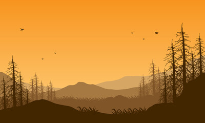 Fototapeta premium Beautiful mountain panorama at dusk from outside the city with aesthetic dry tree silhouette