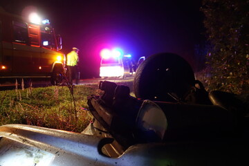 Real event. Car accident. The car crashed at night on a wet road and overturned . Car accident over...