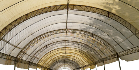 Under large outdoor roof dome construction, canvas and metal for event and parking exhibition.