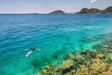 Snorkeling at Twin Beach, a tropical, white sandy beach near Padang in West Sumatra, Indonesia, Asia, background with copy space