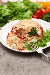Delicious chicken aspic on a plate on concrete table